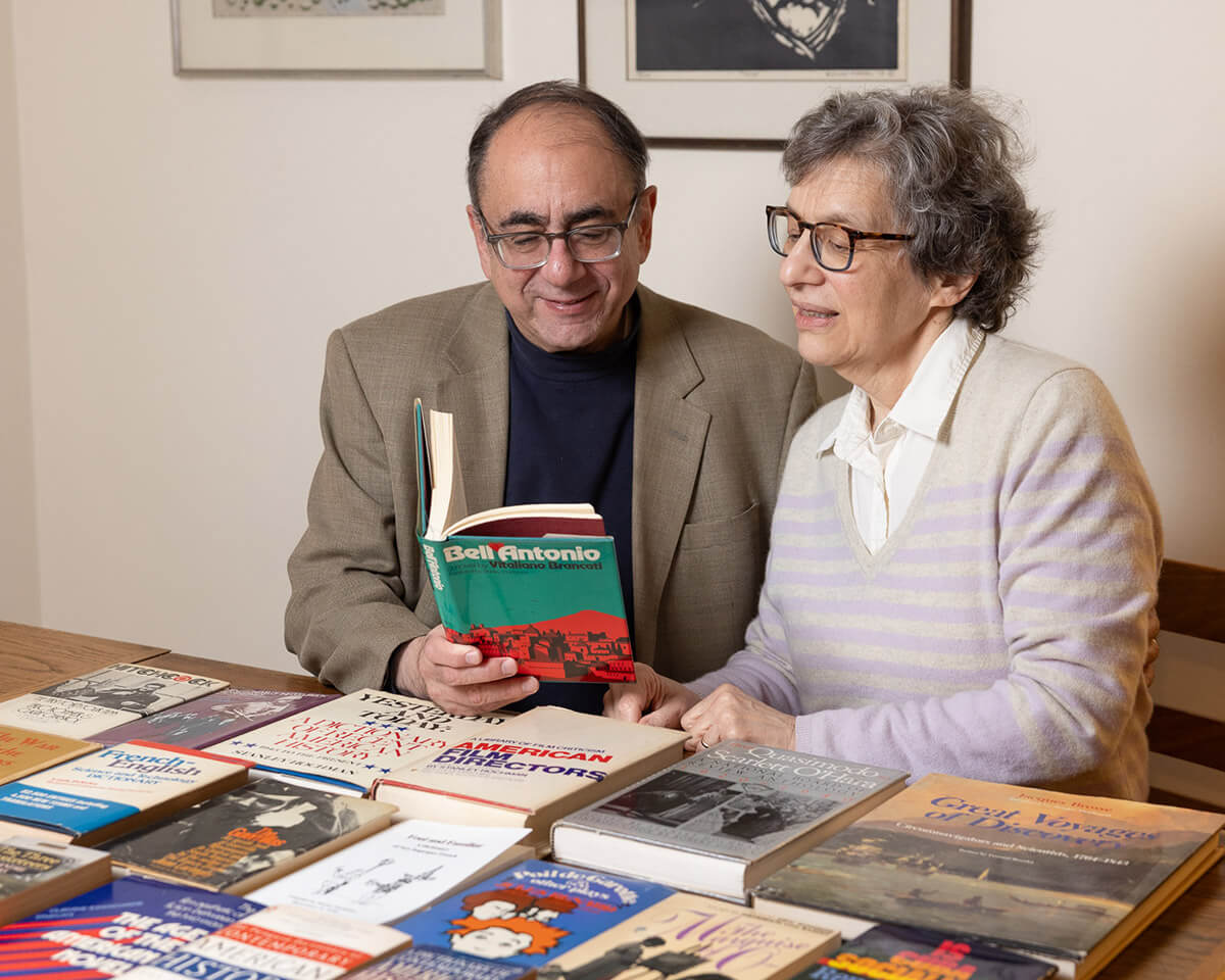 David Hochman and Genie Siegler at home, with a selection of Lee and Stanley Hochman’s published works.