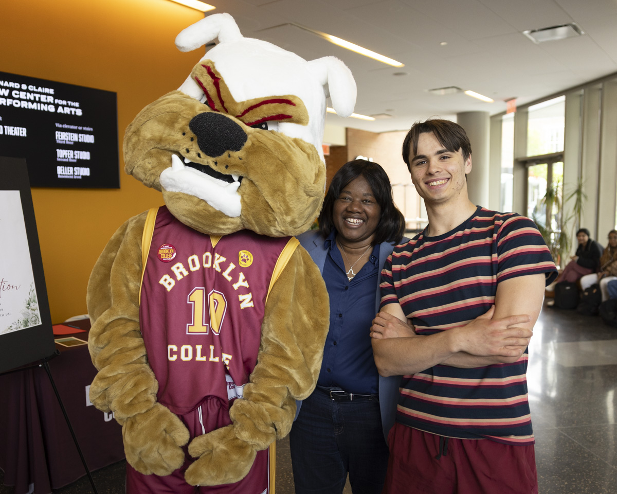 (Left to right) The SEEK Mascot, “Brooklyn,” Deputy Borough President Kim Council, and Michael Kravets Filatov.