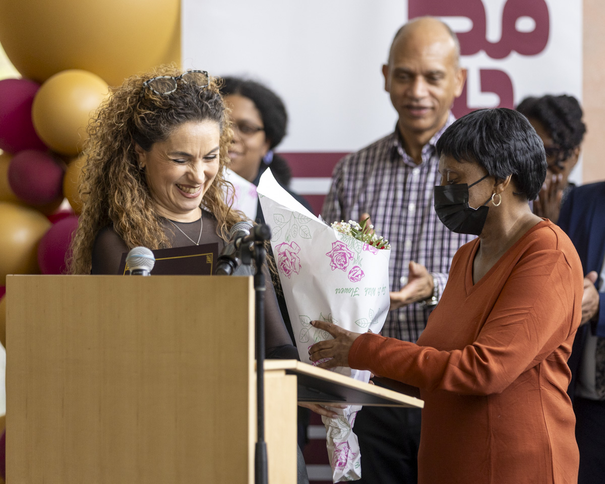 Zoya Khalfin presents a Certificate of Appreciation to Annette Nesbit for her 30 years of service to the SEEK program.
