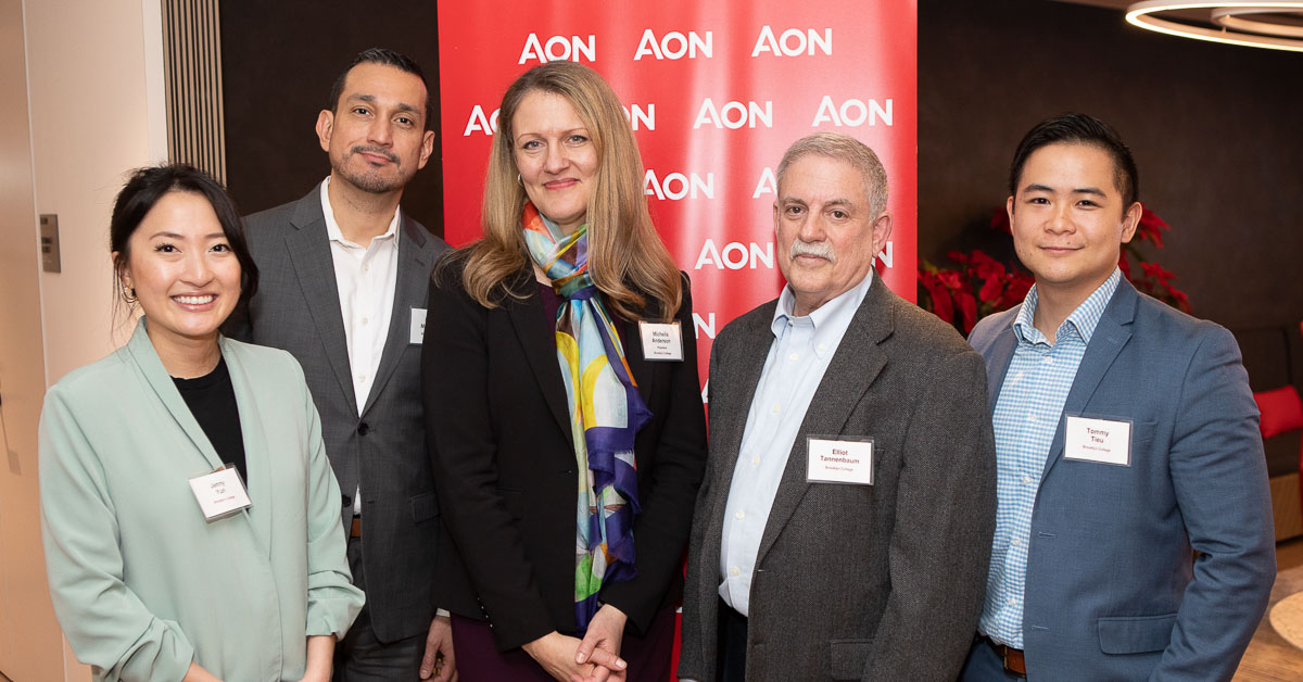 Brooklyn College President Michelle Anderson (center) poses with guests at the Career Partners and Alumni Champions reception. From left to right: Jenny Yun ’16, private tax manager, PricewaterhouseCoopers (PwC); Brooklyn College Board of Trustees Member Daniel Menendez ’09; Eliot Tannebaum ’73, Koppelman School of Business advisory council member, and Tommy Tieu ’14, Mid-Atlantic talent acquisition manager at PwC. The event was held at the headquarters of Aon plc, which, along with PwC and KPMG is a “platinum” career partner.