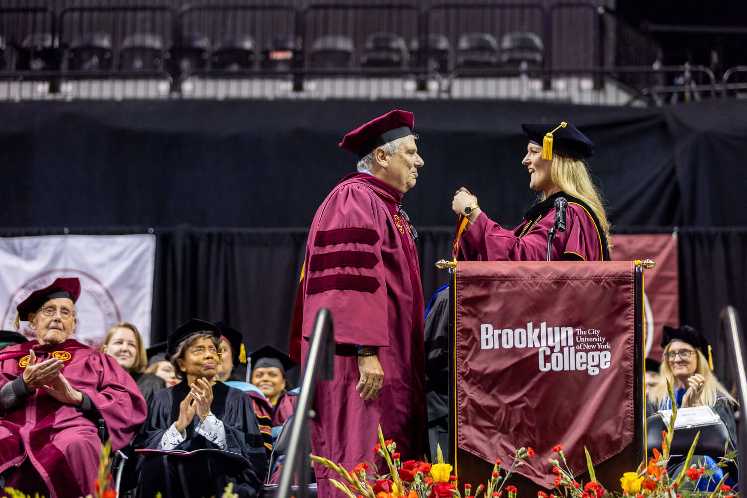 Brooklyn College President Michelle J. Anderson awards Evan Silverstein ’76 with the Presidential Medal of Honor.