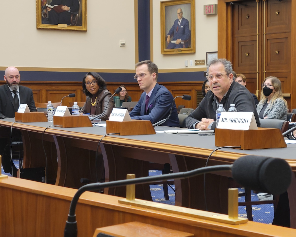 Richard N. Gladstein (right) testifies before House Judiciary Subcommittee on Courts, Intellectual Property, and the Internet on December 13.